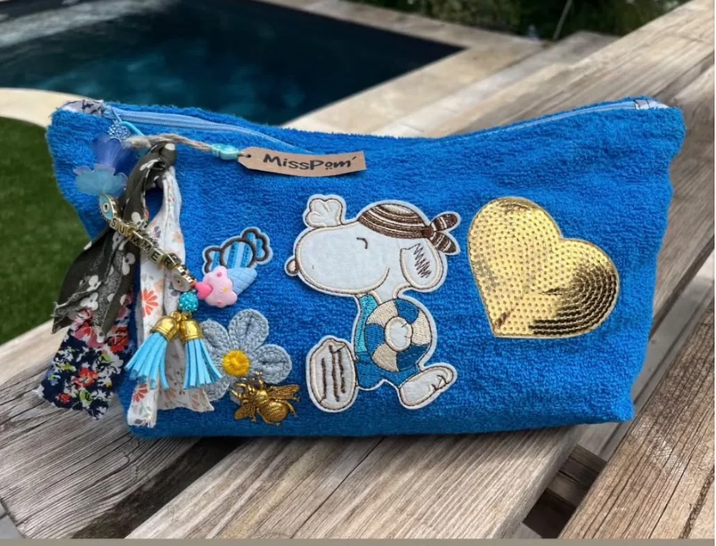 Pochette bleue MissPom' partie à Lyon